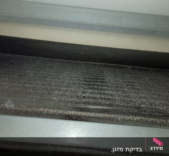 בדיקת מזגן.